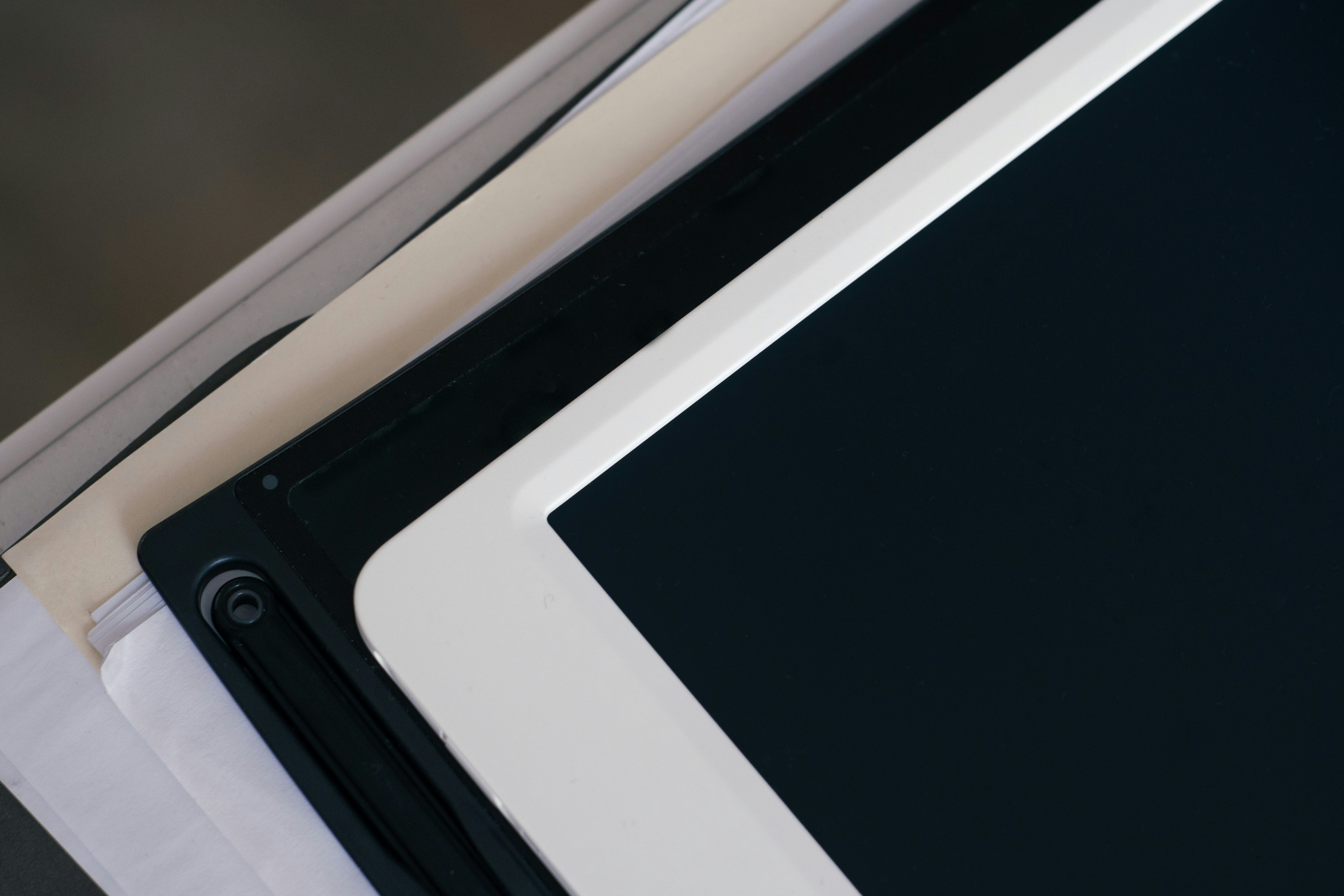 white tablet computer on white table